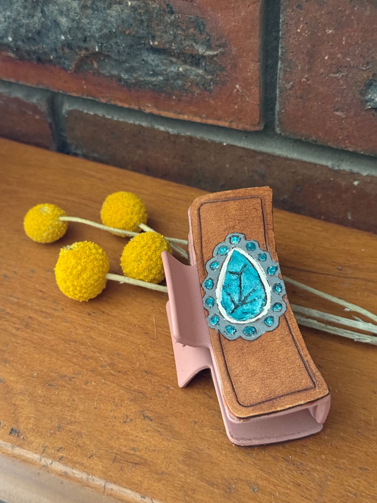 Tooled leather claw hair clip