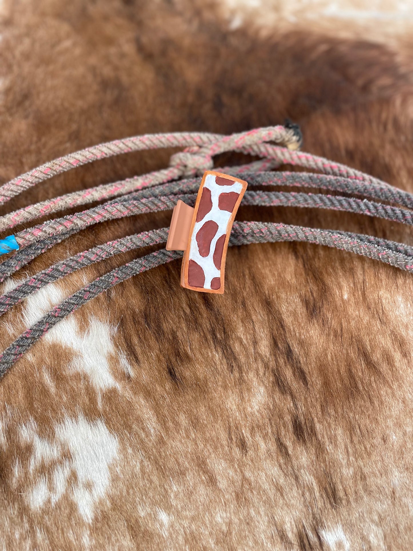 Tooled leather brown cow print claw hair clip