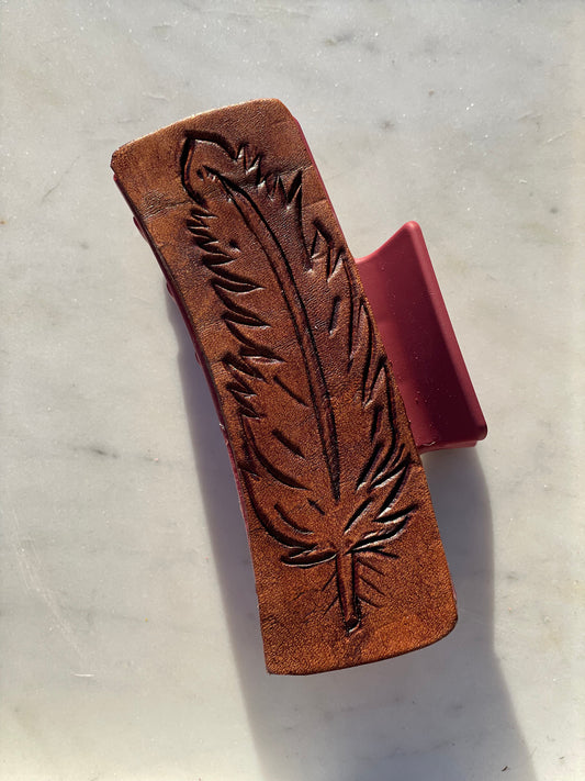 Tooled leather claw hair clip