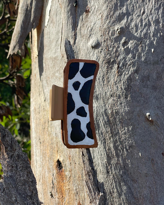 Cow print tooled leather claw clip